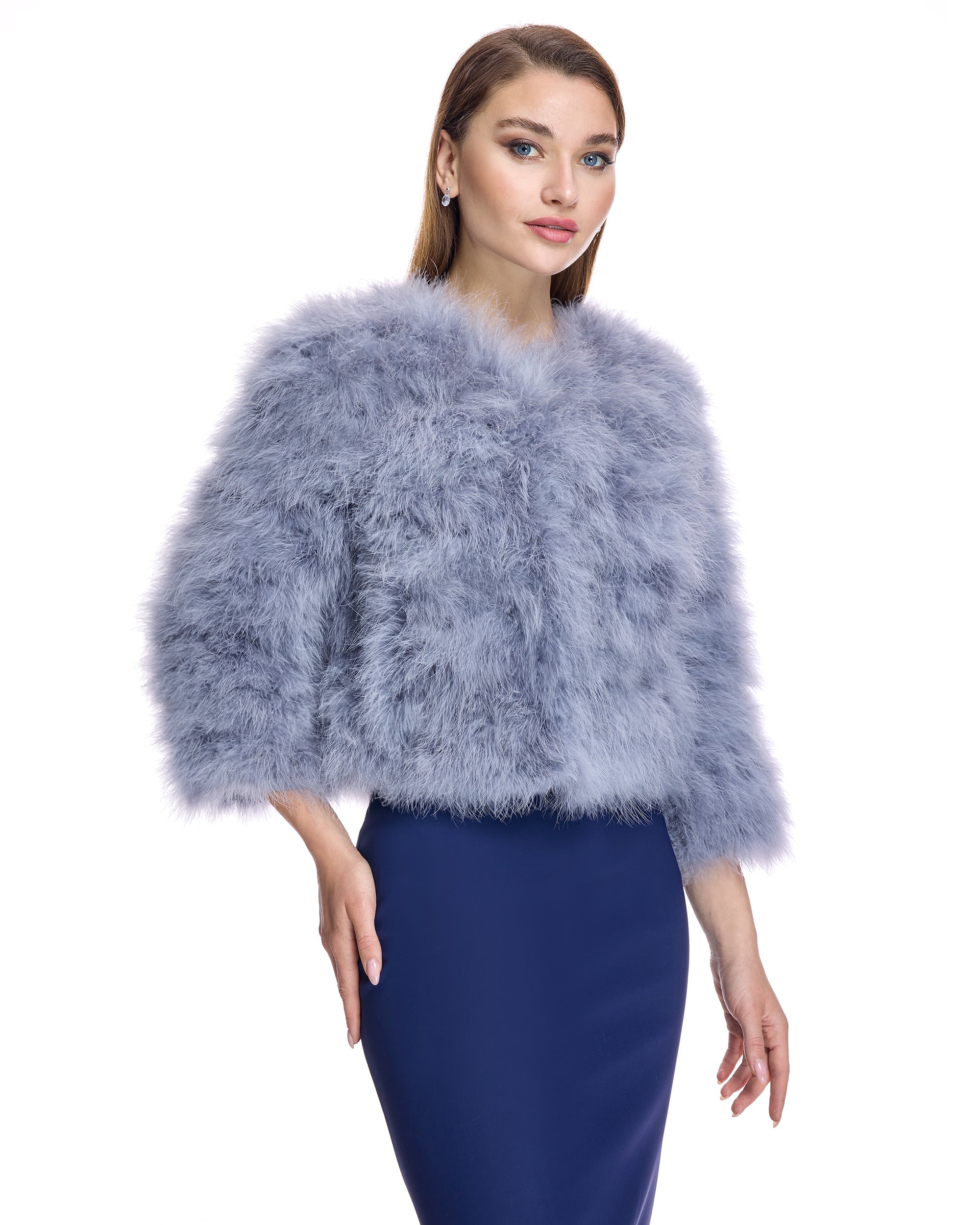 Bolero de plumas de pavo