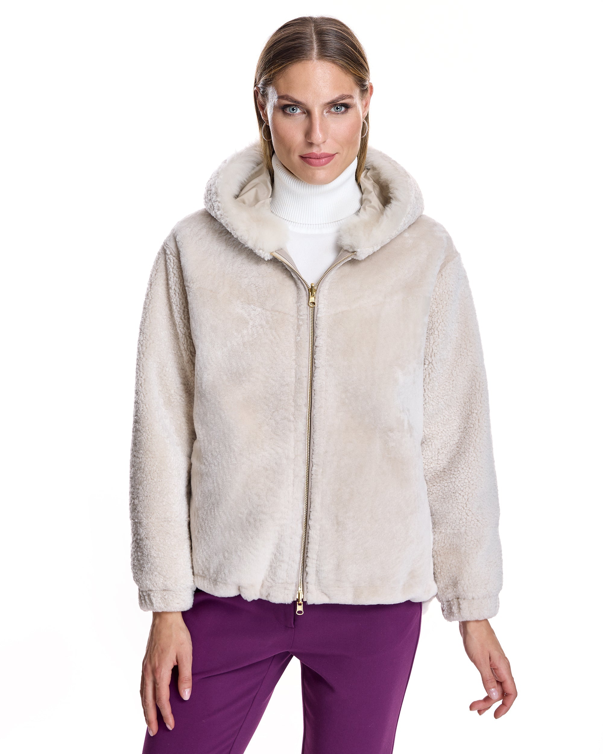 CHAQUETA DE PIEL DE BORREGUITO REVERSIBLE CON CAPUCHA