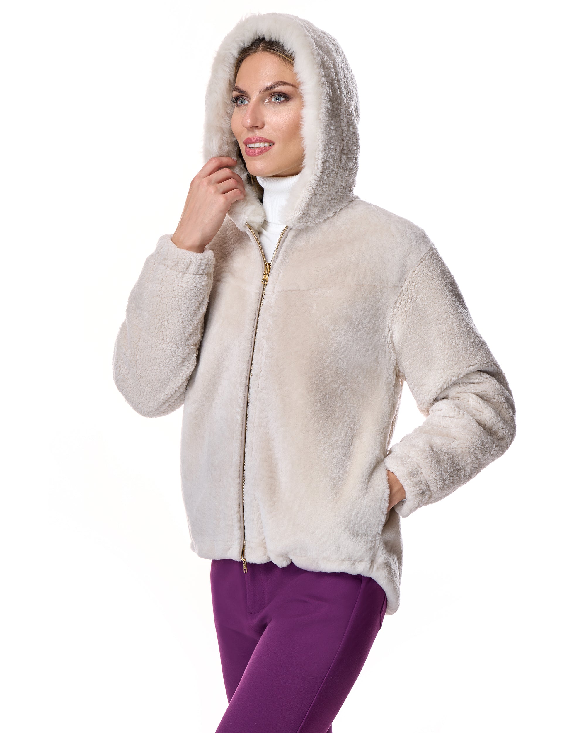 CHAQUETA DE PIEL DE BORREGUITO REVERSIBLE CON CAPUCHA